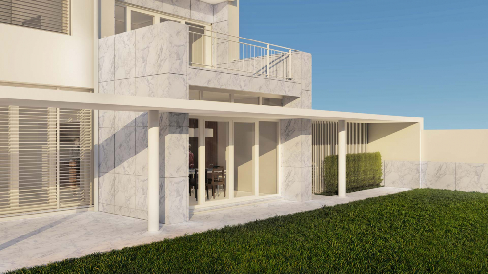 Fachada sobre o jardim do projeto de remodelação de edifício, na Foz