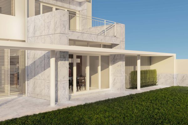 Fachada sobre o jardim do projeto de remodelação de edifício, na Foz