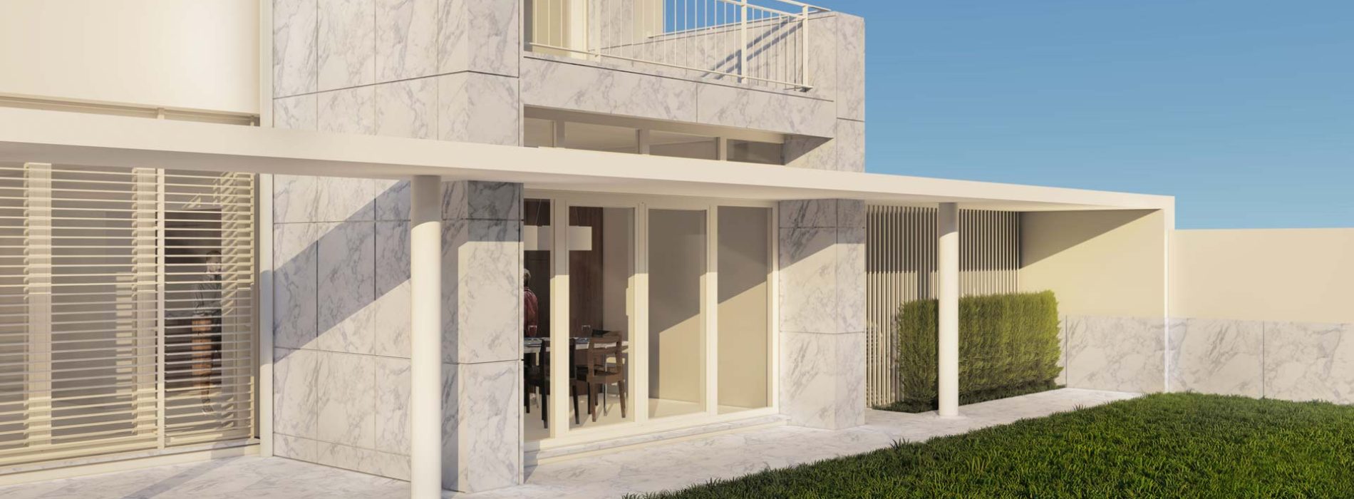 Fachada sobre o jardim do projeto de remodelação de edifício, na Foz